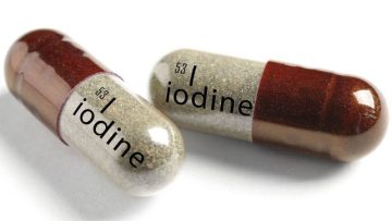 1f911197-Iodine-Capsules-On-White-Backg-416222158