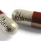 1f911197-Iodine-Capsules-On-White-Backg-416222158